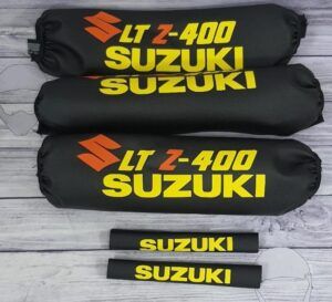 PROTECTORES DE AMORTIGUADORES SUZUKI LTZ naranja/amarillo