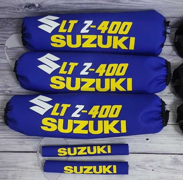 PROTECTORES DE AMORTIGUADORES SUZUKI LTZ400 azul/amarillo/blanco