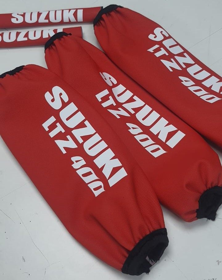 PROTECTORES DE AMORTIGUADORES SUZUKI LTZ400 rojo/blanco