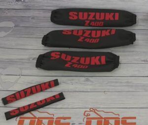PROTECTORES DE AMORTIGUADORES SUZUKI LTZ400 negro/rojo